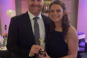 Burnley manager Sean Dyche is presented with his 'Most Incognito Regular' award by Royal Dyche owner Justine Lorriman.