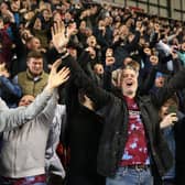 ROTHERHAM, ENGLAND - APRIL 18: Burnley fans show their support during the Sky Bet Championship match between Rotherham United and Burnley at AESSEAL New York Stadium on April 18, 2023 in Rotherham, England. (Photo by Matt McNulty/Getty Images)