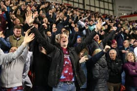 ROTHERHAM, ENGLAND - APRIL 18: Burnley fans show their support during the Sky Bet Championship match between Rotherham United and Burnley at AESSEAL New York Stadium on April 18, 2023 in Rotherham, England. (Photo by Matt McNulty/Getty Images)
