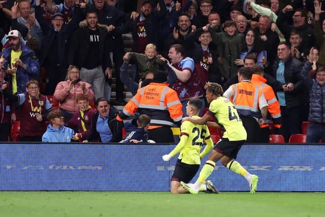 NOTTINGHAM, ENGLAND - AUGUST 30: Zeki Amdouni of Burnley celebrates with Wilson Odobert of Burnley after scoring the team's first goal during the Carabao Cup Second Round match between Nottingham Forest and Burnley at City Ground on August 30, 2023 in Nottingham, England. (Photo by Nathan Stirk/Getty Images)