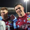 Johann Gudmundsson and Jack Cork of Burnley pose for a photo after winning the Sky Bet Championship following victory against the Blackburn Rovers and Burnley at Ewood Park on April 25, 2023 in Blackburn, England. (Photo by Matt McNulty/Getty Images)