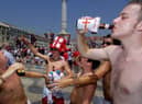 England fans enjoying a beer in the sun