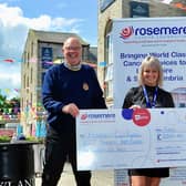 Ribble Valley Ride organisers John Spencer (left) and Bill Honeywell hand over a cheque for £3,375 to Rosemere Cancer Foundation fundraising manager Sue Swire.