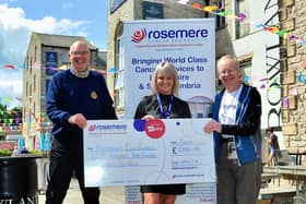 Ribble Valley Ride organisers John Spencer (left) and Bill Honeywell hand over a cheque for £3,375 to Rosemere Cancer Foundation fundraising manager Sue Swire.