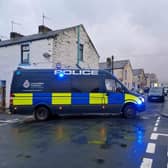 These were the scenes in Burnley's Stoneyholme earlier today after a suspected explosive device was discovered in an outdoor community hub area