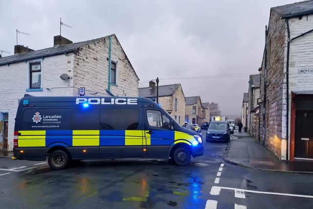 These were the scenes in Burnley's Stoneyholme earlier today after a suspected explosive device was discovered in an outdoor community hub area
