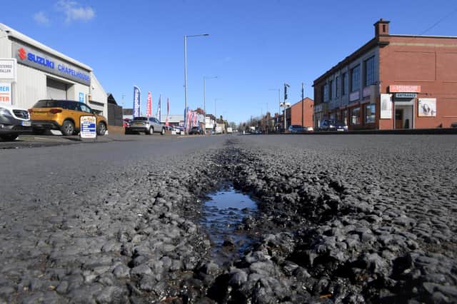 A pothole must usually have become 40mm deep before highways bosses in Lancashire will order it to be filled in (image: Neil Cross)