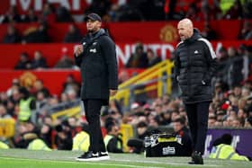 MANCHESTER, ENGLAND - DECEMBER 21: Vincent Kompany, Manager of Burnley, looks on as Erik ten Hag, Manager of Manchester United, reacts during the Carabao Cup Fourth Round match between Manchester United and Burnley at Old Trafford on December 21, 2022 in Manchester, England. (Photo by Jan Kruger/Getty Images)