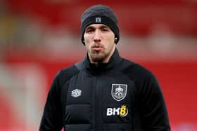 STOKE ON TRENT, ENGLAND - DECEMBER 30: Darko Churlinov of Burnley inspects the pitch prior to the Sky Bet Championship between Stoke City and Burnley at Bet365 Stadium on December 30, 2022 in Stoke on Trent, England. (Photo by Charlotte Tattersall/Getty Images)