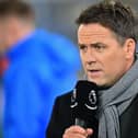 Former Liverpool and England player Michael Owen, working for Amazon Prime TV, works on the pitch ahead of the English Premier League football match between Crystal Palace and Bournemouth at Selhurst Park in south London on December 3, 2019.