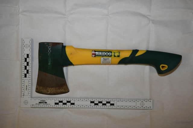 The axe that Andrew Burfield used to kill Katie Kenyon was found in the cellar of his home in Todmorden Road, Burnley.