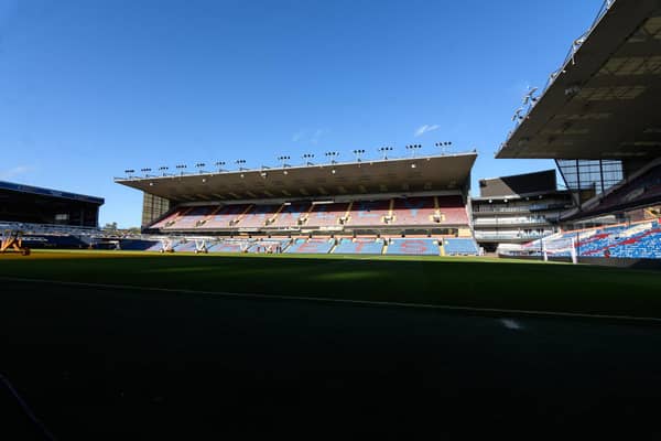 Three people will appear in court following disorder at Turf Moor during the Burnley Football Club versus Manchester City Premier League match
