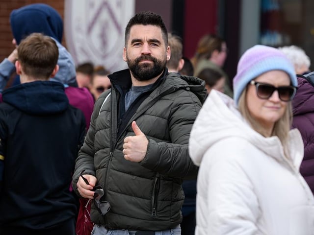 Burnley fans arrive at Turf Moor for the Premier League fixture against Brighton and Hove Albion. Photo: Kelvin Lister-Stuttard