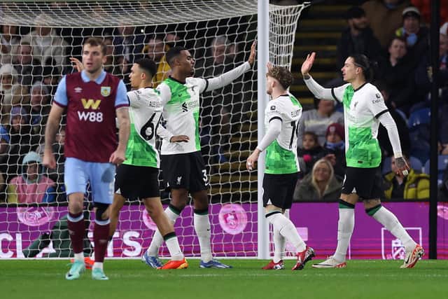 BURNLEY, ENGLAND - DECEMBER 26: Darwin Nunez of Liverpool celebrates with teammates after scoring their team's first goal during the Premier League match between Burnley FC and Liverpool FC at Turf Moor on December 26, 2023 in Burnley, England. (Photo by Lewis Storey/Getty Images)