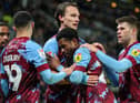 Burnley's Nathan Tella celebrates scoring the opening goal with teammates 

The EFL Sky Bet Championship - Hull City v Burnley - Wednesday 15th March 2023 - MKM Stadium - Kingston upon Hull