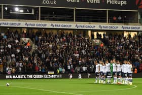 Preston North End players acknowledge a minute’s silence for Her Majesty Queen Elizabeth II.