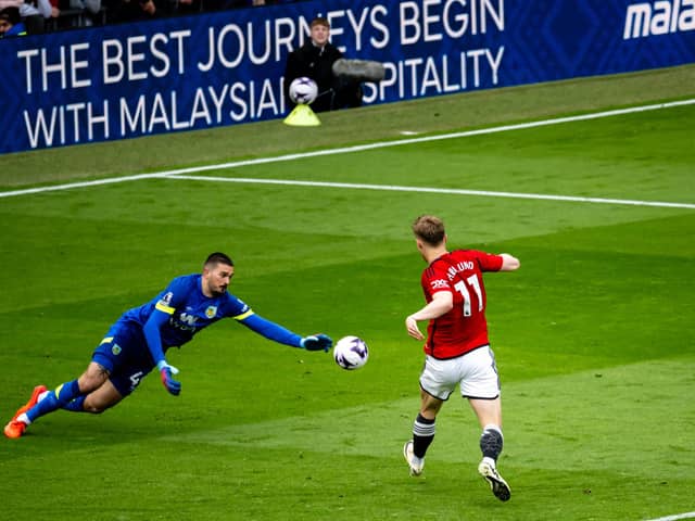 Made three big saves, all from Antony, but couldn’t quite stretch far enough to deny the Brazilian for United’s late goal.