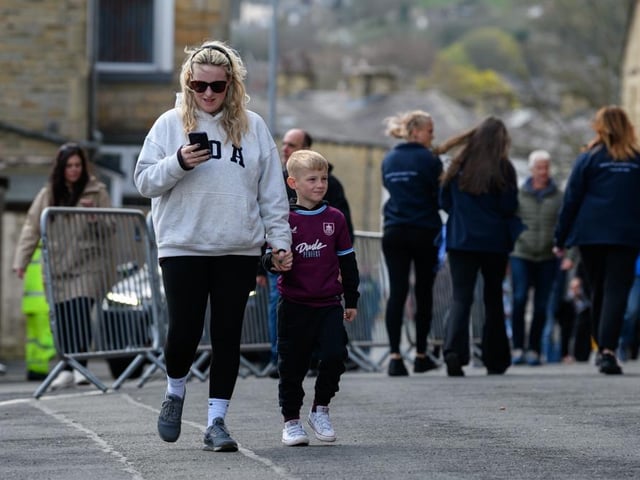 Burnley fans arrive at Turf Moor for the Premier League fixture against Brighton and Hove Albion. Photo: Kelvin Lister-Stuttard