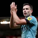 STOKE ON TRENT, ENGLAND - DECEMBER 30: Josh Cullen of Burnley applauds fans following their sides victory after the Sky Bet Championship match between Stoke City and Burnley at Bet365 Stadium on December 30, 2022 in Stoke on Trent, England. (Photo by Charlotte Tattersall/Getty Images)