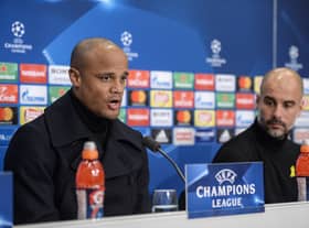 Manchester City's Belgian defender Vincent Kompany (L) and Manchester City's Spanish coach Pep Guardiola hold a press conference on February 12, 2018, in Basel, on the eve of the UEFA Champions League round of 16 football between Basel and Manchester City. / AFP PHOTO / SEBASTIEN BOZON