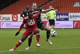 Essevee's Laurens De Bock and Standard's Jackson Muleka Kyanvubu fight for the ball during a soccer match between Standard de Liege and SV Zulte Waregem, Sunday 26 December 2021 in Liege, on day 21 of the 2021-2022 'Jupiler Pro League' first division of the Belgian championship. BELGA PHOTO JOHAN EYCKENS (Photo by JOHAN EYCKENS/BELGA MAG/AFP via Getty Images)