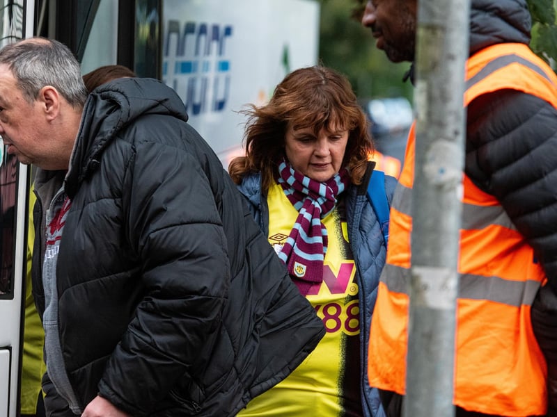 Burnley fans arrive at the Peninsula Stadium for the Carabao Cup tie with Salford City. Photo: Kelvin Lister-Stuttard