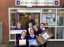 Year 4 pupils from St Mary Magdalen's RC Primary School, Burnley, with their donated pizza supplies