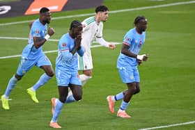 Tuanzebe pictured in action for Congo at the African Cup of Nations in January (Photo by SEBASTIEN BOZON / AFP via Getty Images)