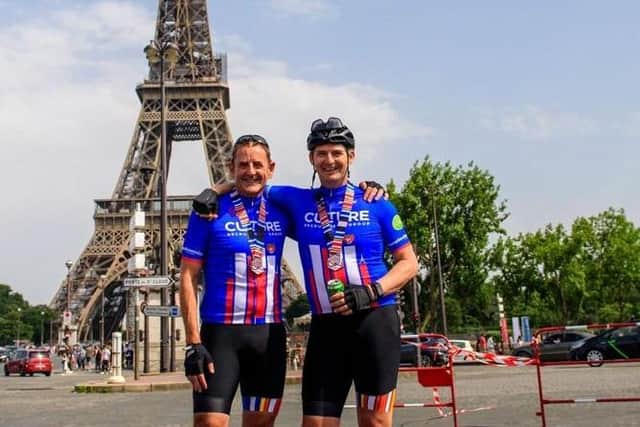 Booths Managing Director Nigel Murray (right) and fellow cyclist Tim Marshall of Siemens celebrate completing the London2Paris ride in aid of Cure Leukaemia earlier this month