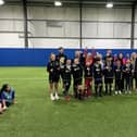 Pupils from Barden and St John’s Cliviger primary schools, along with youngsters from Daneshouse Football Club,  who took part in the inter-faith match that was filmed by the BBC