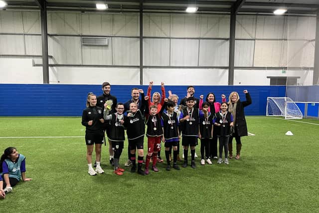 Pupils from Barden and St John’s Cliviger primary schools, along with youngsters from Daneshouse Football Club,  who took part in the inter-faith match that was filmed by the BBC