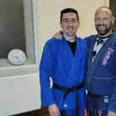 Burnley teacher Ryan McCaffrey (left) with Oswaldtwistle's Kuon Ji Ju Jitsu Association's head coach  Max Robinson, the current World and National champion, who also took part in the world record attempt.