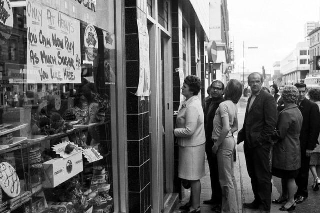 Glasgow shoppers queue at an Argyle Street grocers for sugar, available after the shortage of August 1974.