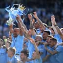 BRIGHTON, ENGLAND - MAY 12:   Manchester City captain Vincent Kompany lifts the Premier League Trophy after the Premier League match between Brighton & Hove Albion and Manchester City at American Express Community Stadium on May 12, 2019 in Brighton, United Kingdom. (Photo by Shaun Botterill/Getty Images)