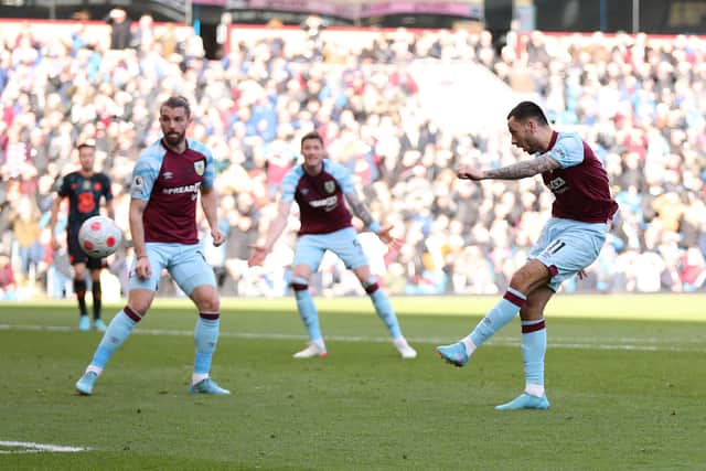 BURNLEY, ENGLAND - MARCH 05: Dwight McNeil of Burnley shoots but fails to hit the target during the Premier League match between Burnley and Chelsea at Turf Moor on March 05, 2022 in Burnley, England. (Photo by Lewis Storey/Getty Images)