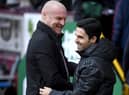 BURNLEY, ENGLAND - FEBRUARY 02: Sean Dyche, Manager of Burnley embraces Mikel Arteta, Manager of Arsenal prior to the Premier League match between Burnley FC and Arsenal FC at Turf Moor on February 02, 2020 in Burnley, United Kingdom.