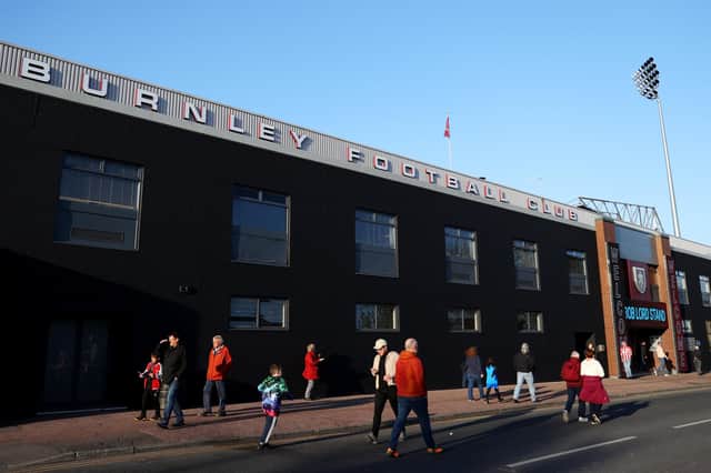 BURNLEY, ENGLAND - APRIL 21: A general view outside the stadium as fans arrive at the stadium prior to the Premier League match between Burnley and Southampton at Turf Moor on April 21, 2022 in Burnley, England. (Photo by Catherine Ivill/Getty Images)