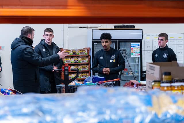 Ian Maatsen recently visited Burnley's club-run foodbank alongside Dara Costelloe (Photo: Kelvin Stuttard)
