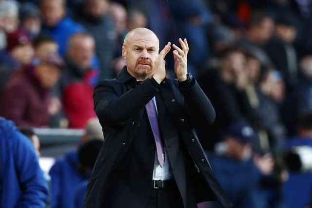 BURNLEY, ENGLAND - APRIL 06: Sean Dyche, Manager of Burnley applauds fans prior to the Premier League match between Burnley and Everton at Turf Moor on April 06, 2022 in Burnley, England. (Photo by Clive Brunskill/Getty Images)