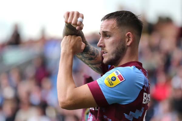 BURNLEY, ENGLAND - AUGUST 06: Josh Brownhill of Burnley FC signals to his teammates in the opposition's penalty box during the Sky Bet Championship match between Burnley and Luton Town at Turf Moor on August 06, 2022 in Burnley, England. (Photo by Ashley Allen/Getty Images)