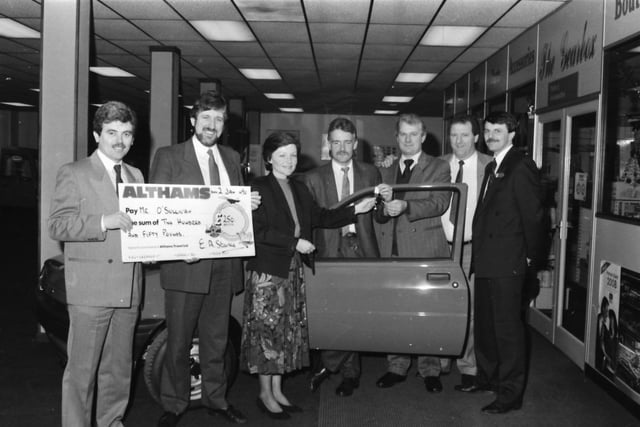 Left to right Mr Daniel O’Sullivan, holiday winner, Mr Peter Mackie, Althams, Mrs Linda Shutt, raffle organiser, Mr Kevin Makin and Mr Brian Walsh, joint car winners, Mr Myles Moore, who sold the winning ticket and Mr John Greenall, sales manager at Skippers.