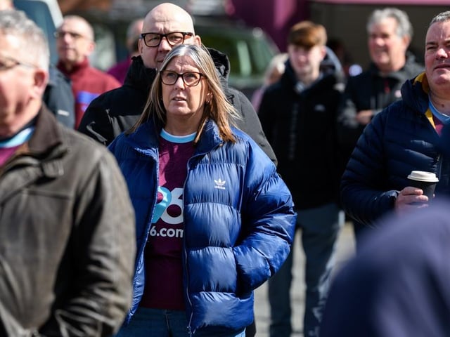 Burnley fans arrive at Turf Moor for the Premier League fixture against Brighton and Hove Albion. Photo: Kelvin Lister-Stuttard