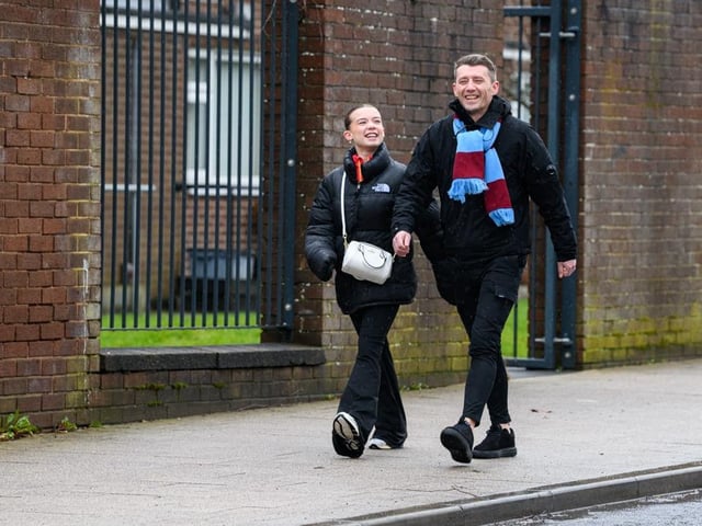Burnley fans arrive at Turf Moor for the Premier League fixture against West Ham United. Photo: Kelvin Lister-Stuttard