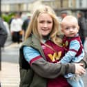 Burnley fans arrive at Turf Moor the Premier League fixture against Brighton and Hove Albion. Photo: Kelvin Lister-Stuttard