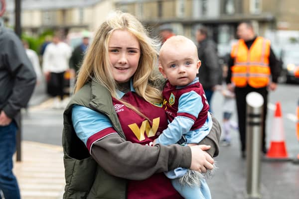Burnley fans arrive at Turf Moor the Premier League fixture against Brighton and Hove Albion. Photo: Kelvin Lister-Stuttard