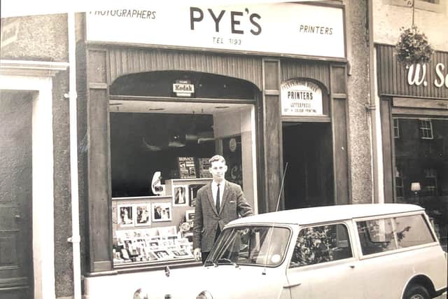 John Pye the photographer outside the family business in Clitheroe