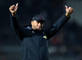 SWANSEA, WALES - JANUARY 02: Vincent Kompany, Manager of Burnley, acknowledges the fans following his team's victory in the Sky Bet Championship between Swansea City and Burnley at Liberty Stadium on January 02, 2023 in Swansea, Wales. (Photo by Dan Istitene/Getty Images)