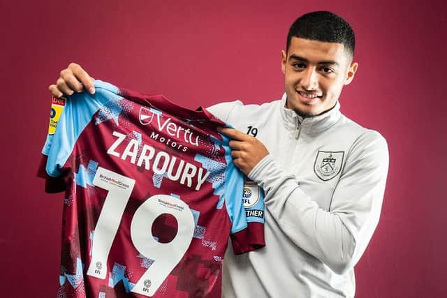 Burnley have completed the signing of Anass Zaroury from Charleroi