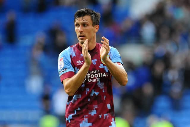 Burnley's Jack Cork applauds the fans at the final whistle 

Skybet Championship - Cardiff City v Burnley - Saturday 1st October 2022 - Cardiff City Stadium - Cardiff
