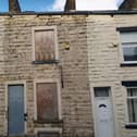 The two-bedroom terrace home on Herbert Street, Burnley, has a guide price of £10,000-plus.